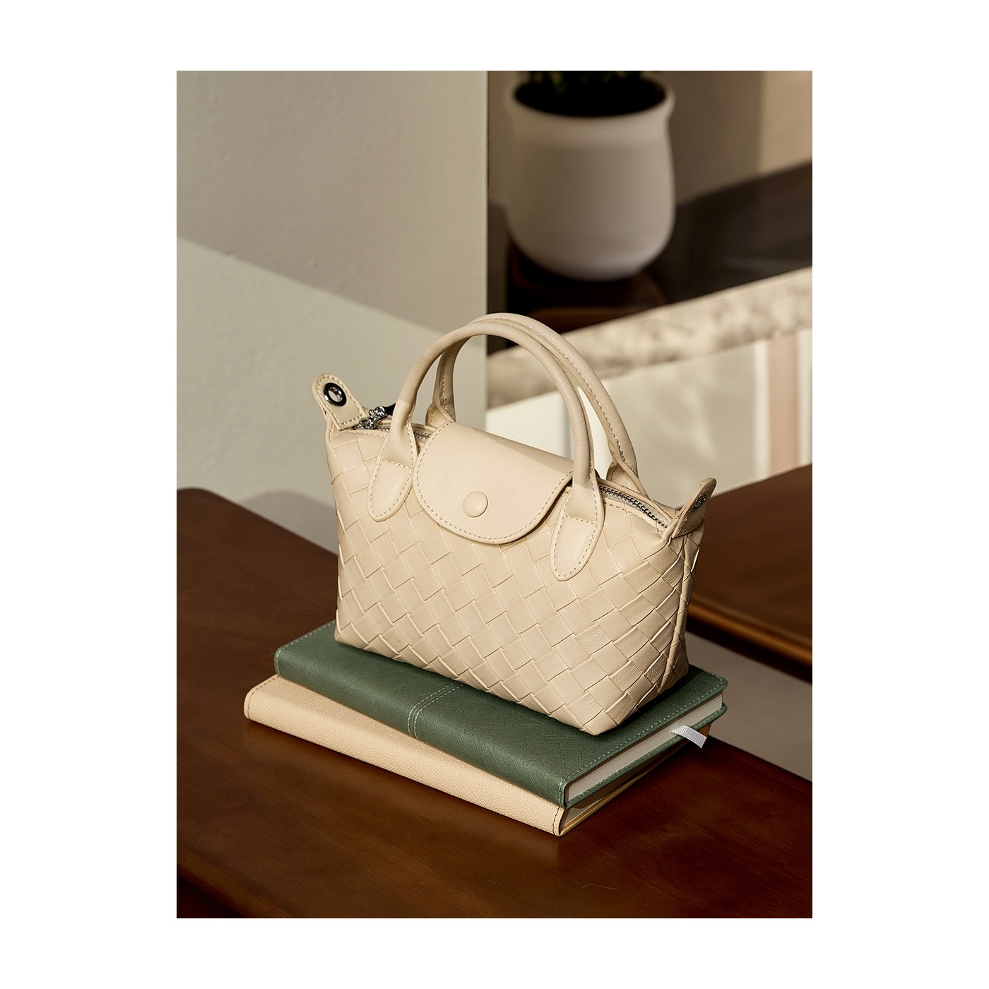 Product image 5 of Mini Woven Leather Dumpling Crossbody Bag for wholesale handbag buyers