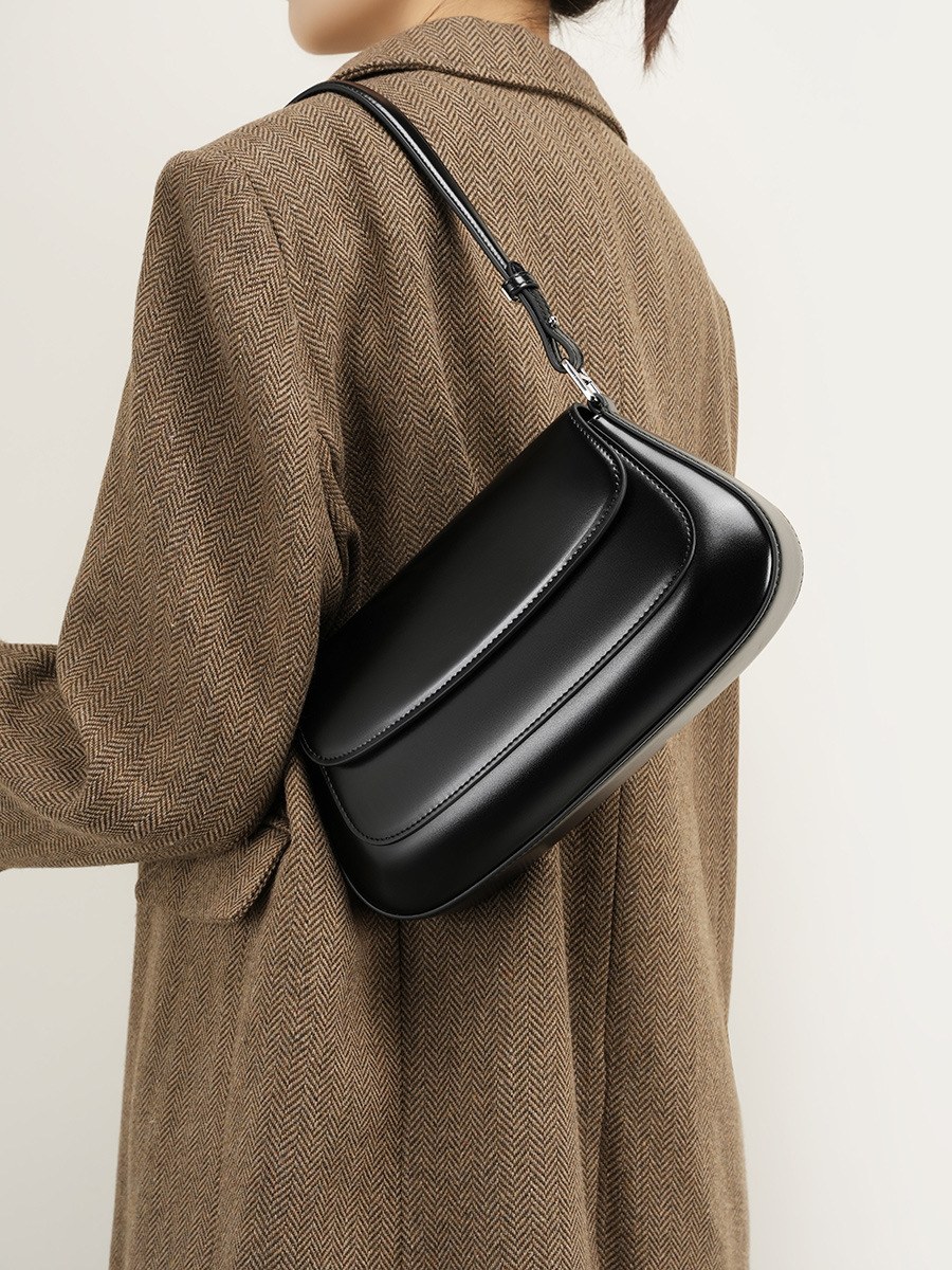 Curved Leather Saddle Shoulder Bag product image for B2B handbag collection